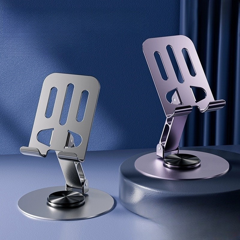 Suporte de mesa em liga de alumínio/plástico com base giratória ajustável em 360°, adequado para smartphones e tablets.