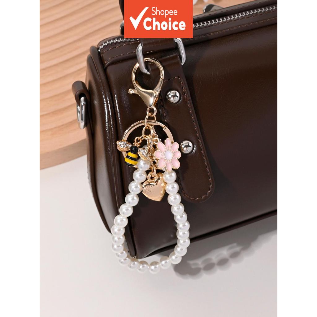  Elegante e versátil chaveiro de pulseira com pérolas artificiais em formato de coração, abelha e margarida, ideal para
