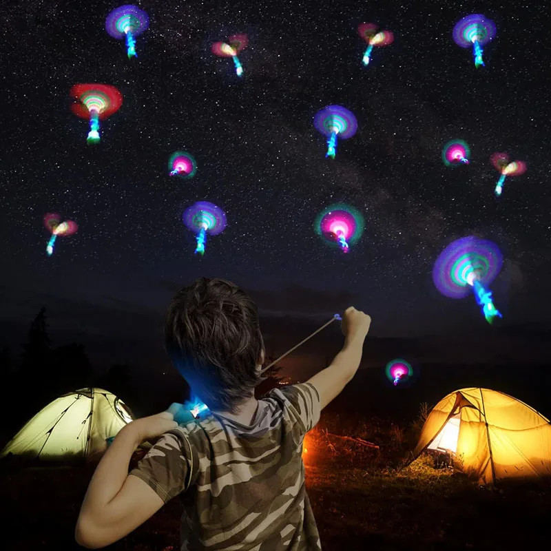 Kit5/10/15/20/25/30Brinquedo Avatar Voador Rotativo Foguete Lançador Estilingue Brilha Luz De Led Helicoptero