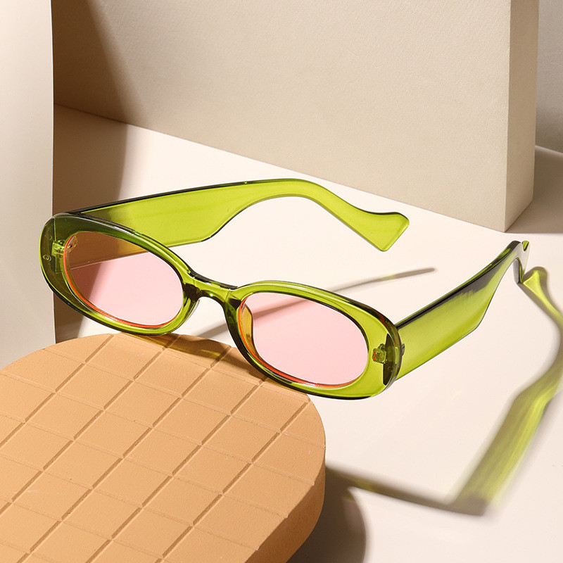 Óculos de sol redondos e elegantes, óculos de sol femininos com estilo de rua único, óculos de sol modernos.