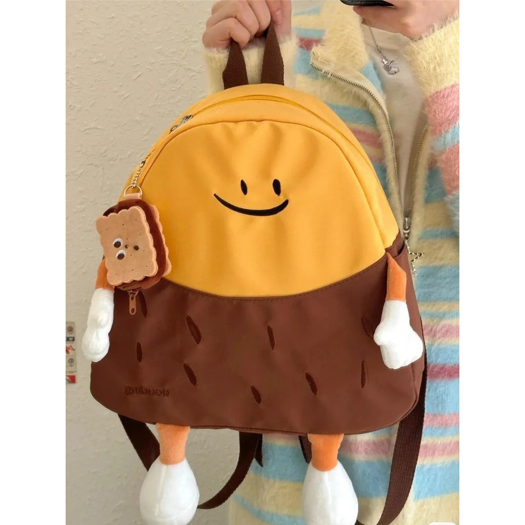 [SJB] Mochila fofa em formato de batata doce, masculina, feminina, novo estilo, desenho animado, engraçado, feio, fofa,