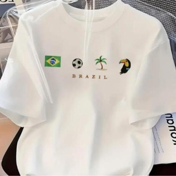 Camiseta Masculina Feminina Oversized Estampa Bandeira do Brasil, Bola de Futebol, Coqueiro e Tucano "BRAZIL"