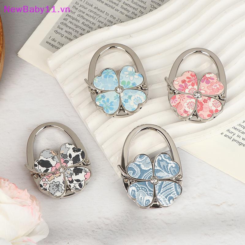 NewBaby Na Moda Bolsa Gancho Dobrável Flores Cabide Portátil Saco De Armazenamento Para Interior Ao Ar Livre Mesa Latera