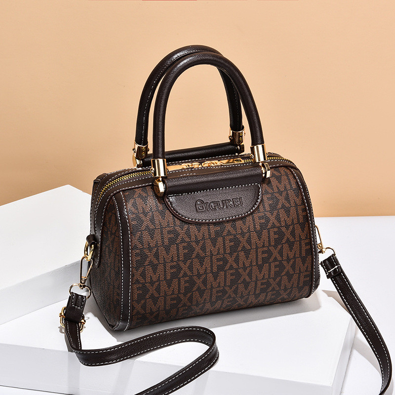 [Bolsa feminina Shichen] Bolsa feminina verão novo estilo bolsa Boston moda retrô bolsa de ombro simples bolsa de comuni