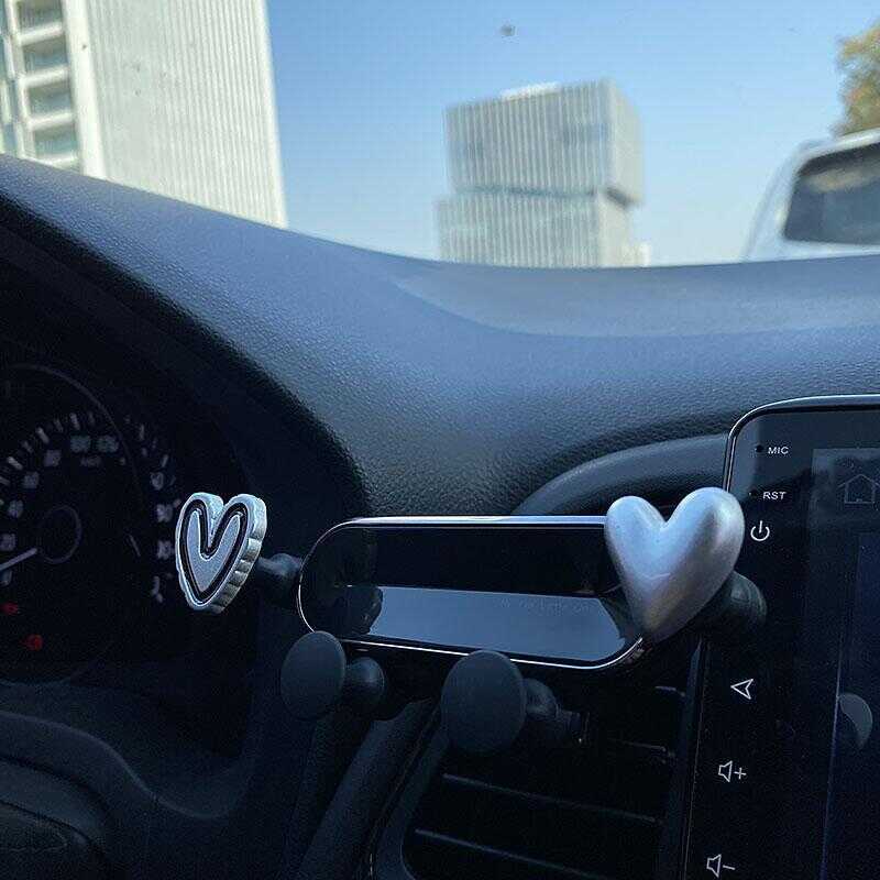 Bump coração Smiley Face suporte do telefone do carro saída de ar gravidade Anti-shake fixo navegação do carro dos desen