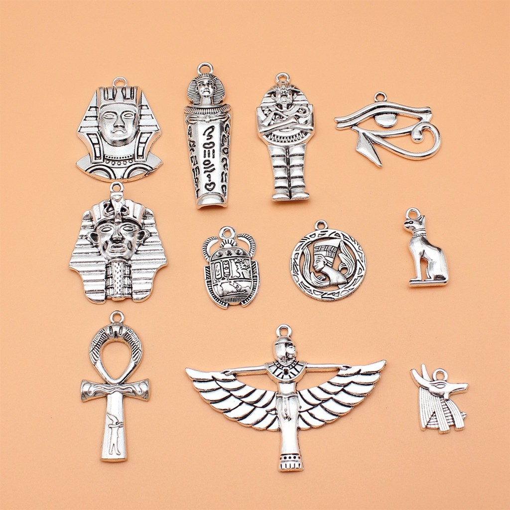 WYSIWYG 11 Peças Cor Prata Antiga Misteriosa Série Egito Antigo Anubis Horus Faraó Ankh Cruz Amuletos Coleção