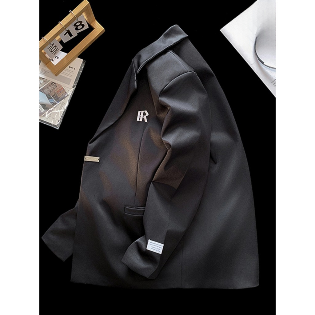 Estilo Preppy casal pequeno terno outono nicho Design sentido ombro acolchoado terno solto na moda Casual rufião bonito 